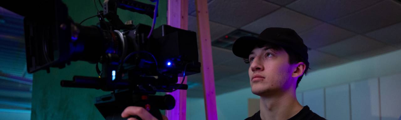 A videographer filming the Presidents' Ball video shoot